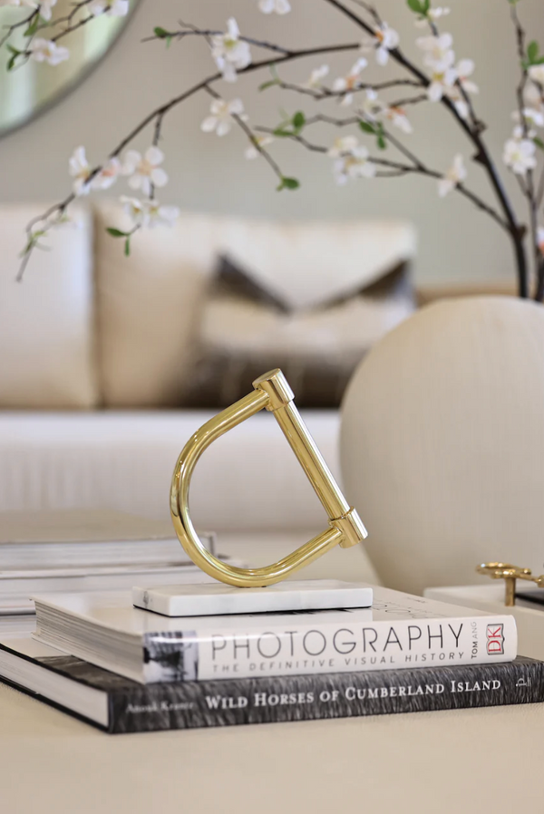Stirrup Decor Golden brass with  white Marble stand.