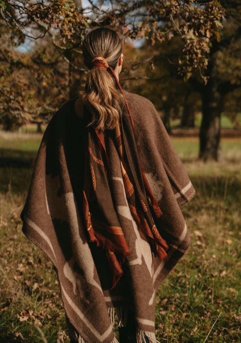 PONCHO HORSES LAMBS WOOL